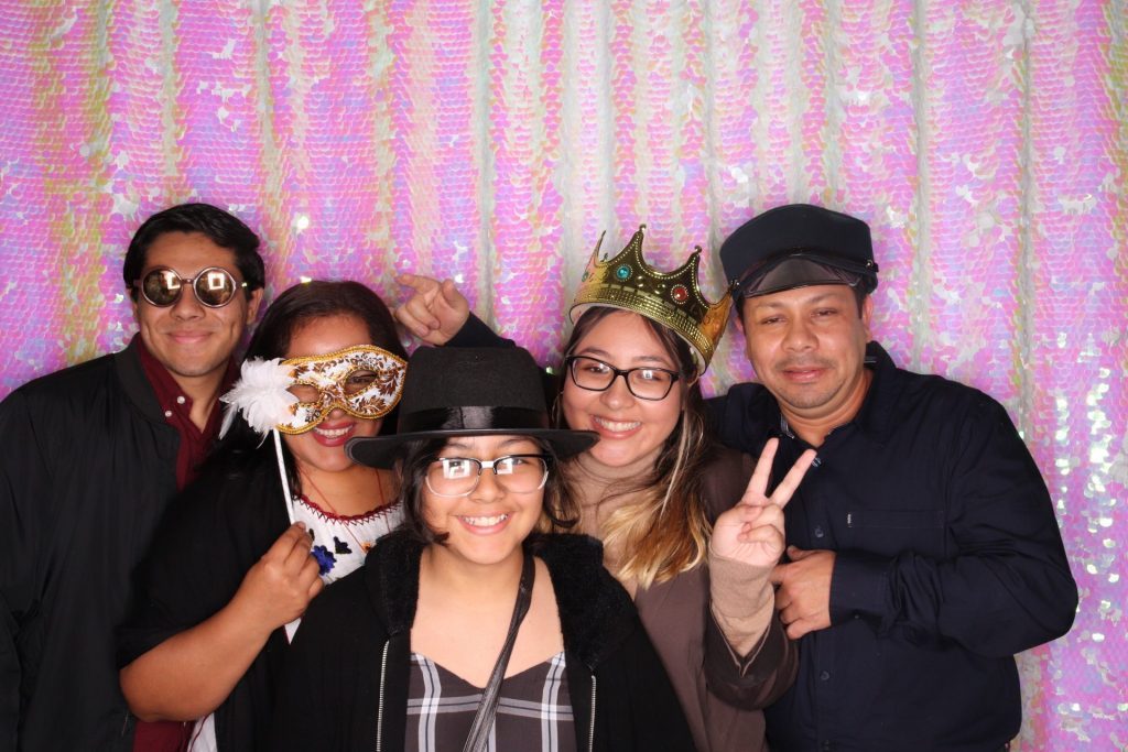 A Family Taking Selfie From Photobooth